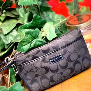 Signature coated canvas with crossgrain leather details